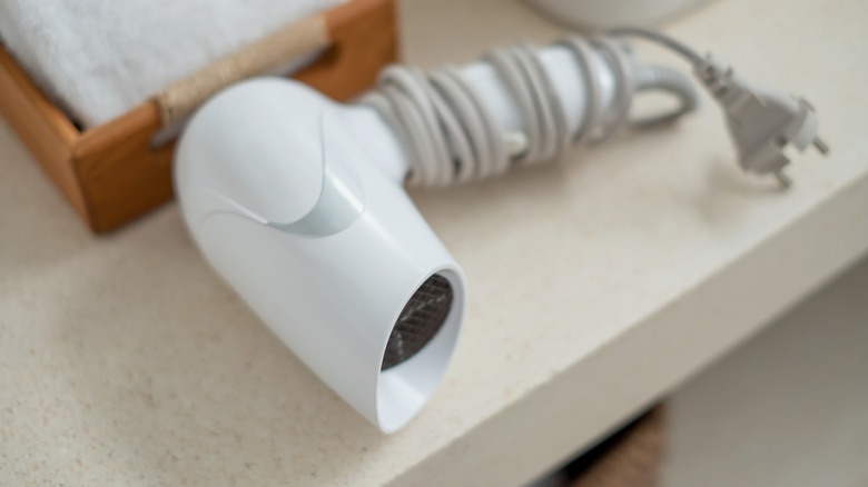 Hair dryer sitting on a counter