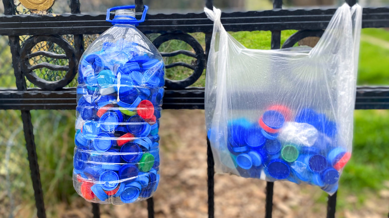 plastic bottle full of caps