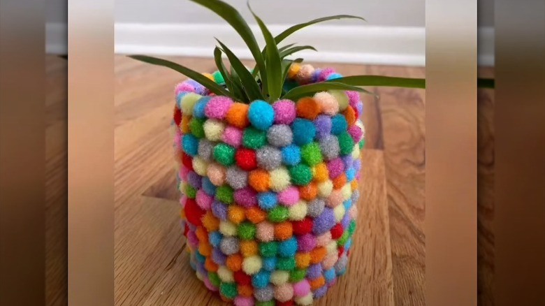 pom poms covering planter