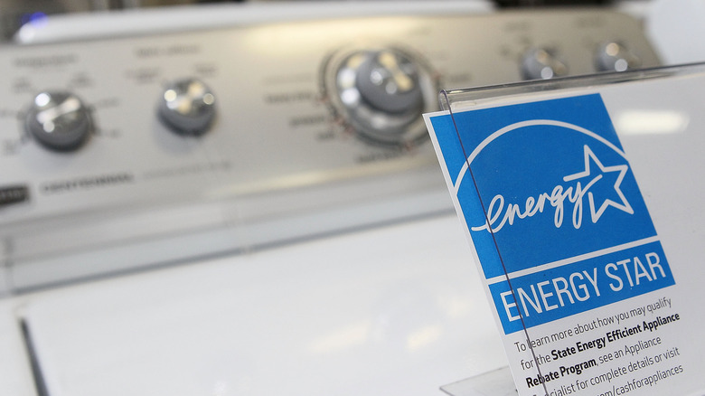 Washing machine in store with Energy Star sign on top