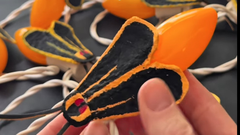 The finished lightning bug craft with light