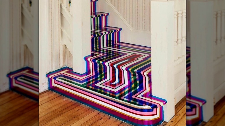 A colorful Jim Lambie vinyl tape design on a staircase at the Saatchi Museum