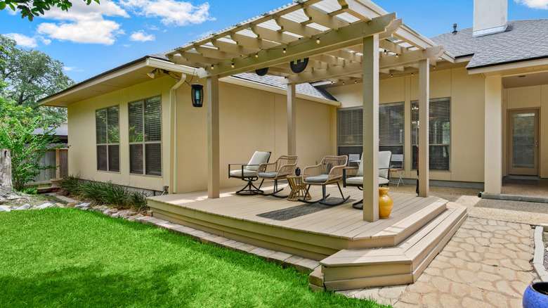 stamped concrete patio with table and chairs