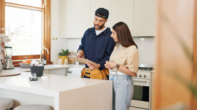 Contractor discussing renovation with homeowner