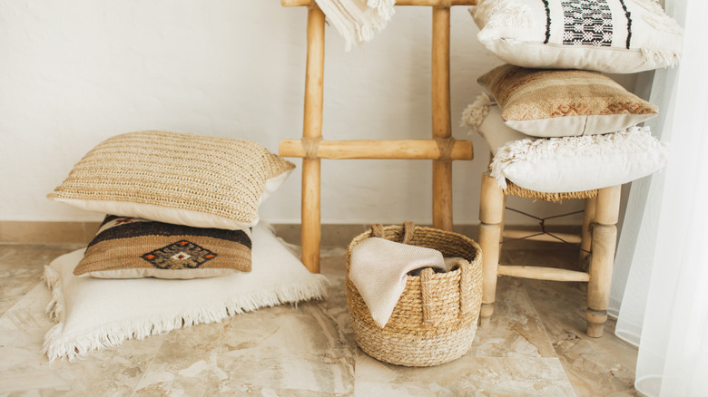 A woven basket surrounded by farmhouse decor