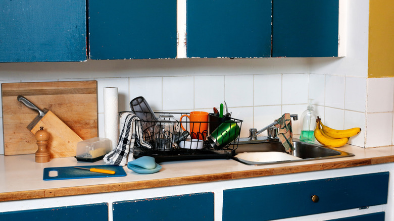 A cluttered kitchen countertop