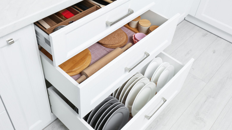 Opened kitchen drawers