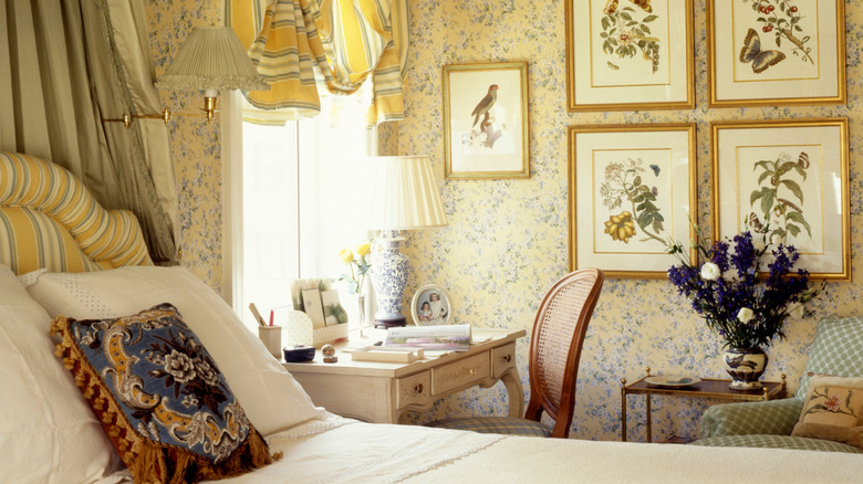 Cottagecore bedroom with floral and stripe accents