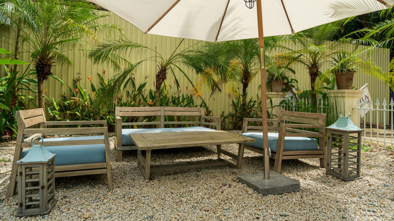 A shady tropical gravel patio is a sustainable yard feature