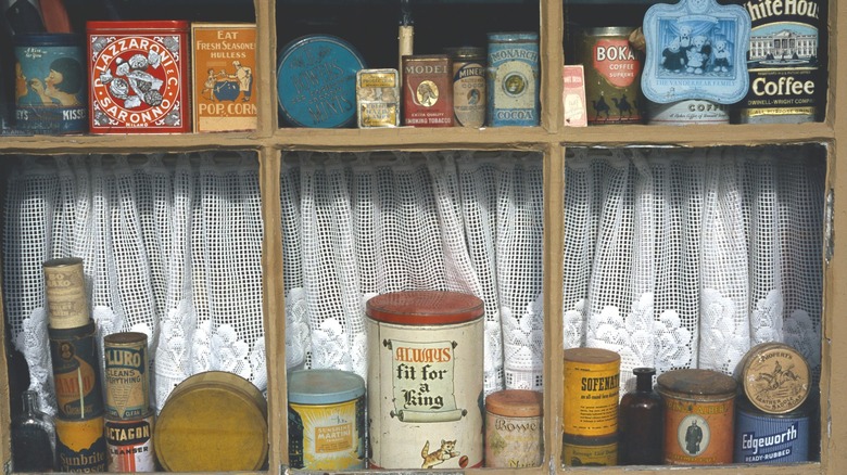 Vintage food containers in window