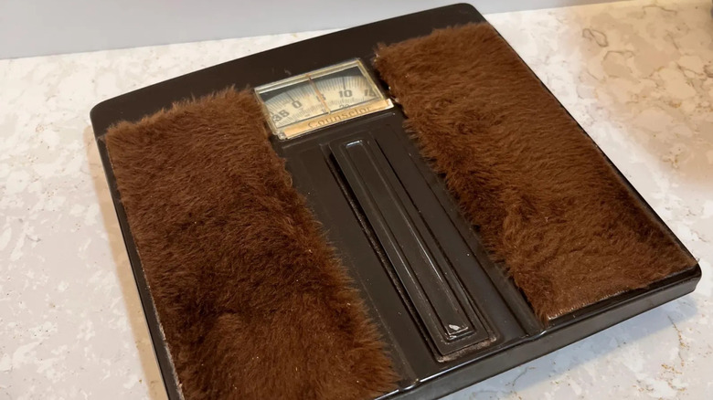 brown fuzzy 1960s bathroom scale