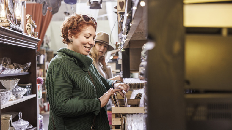 woman shopping for antiques