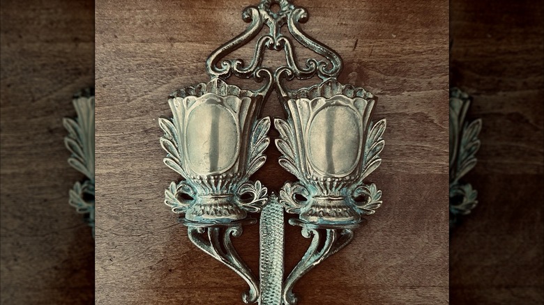 Vintage brass hanging match holder