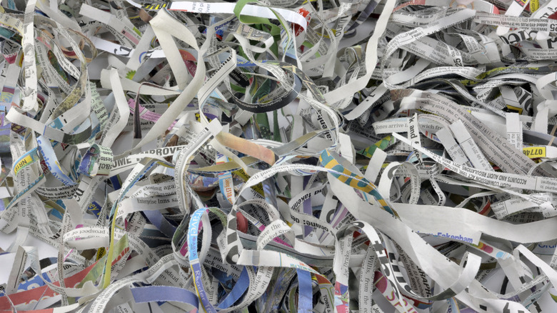 Shredded newspaper piled up.
