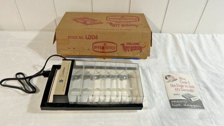 A Presto Hot Dogger with an original box and instruction manual