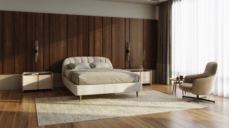Bedroom with a brown and neutral color scheme.