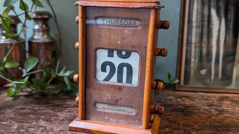 Antique mahogany perpetual desk calendar