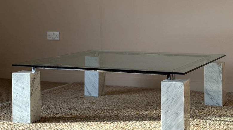 Stone table with a glass top