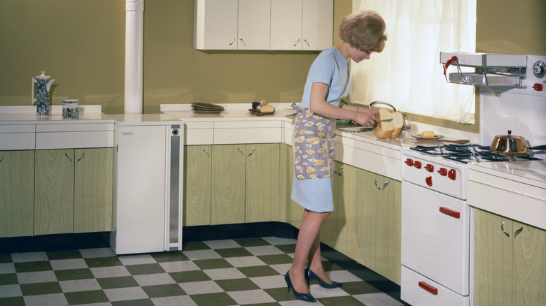 Retro kitchen with vintage appliances and green cabinets