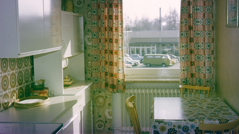 A green, 1970s kitchen design