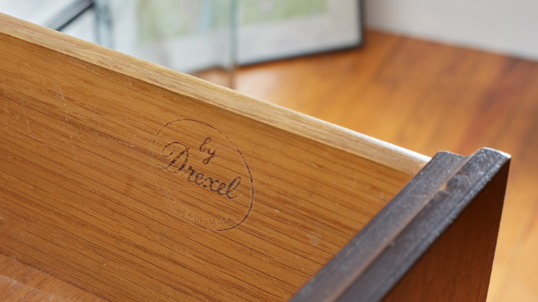 Close-up of Drexel Heritage furniture stamp inside a drawer