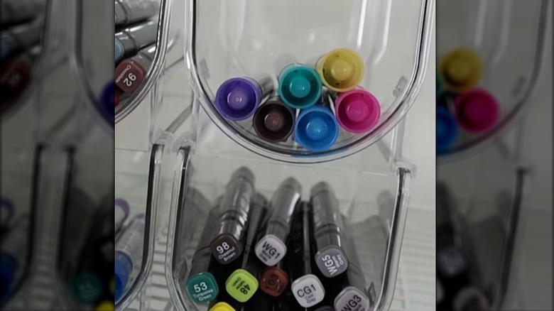 markers and pens in dollar tree holders