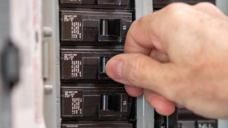 flipping switch in circuit breaker box