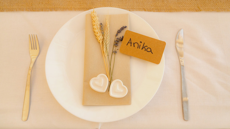 guest place card on plate