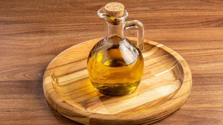 Oil Cruet on a wooden plater