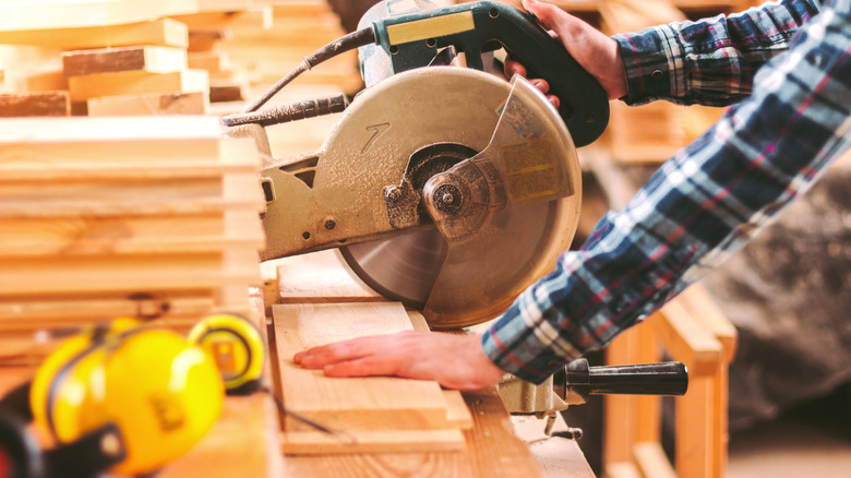 Man cutting plywood
