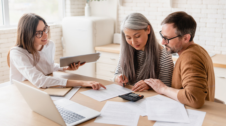 Couple looks at paperwork