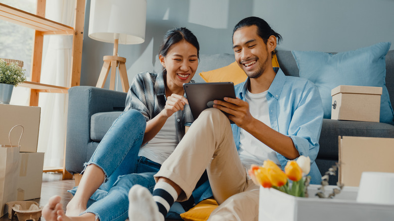 Couple looking at iPad