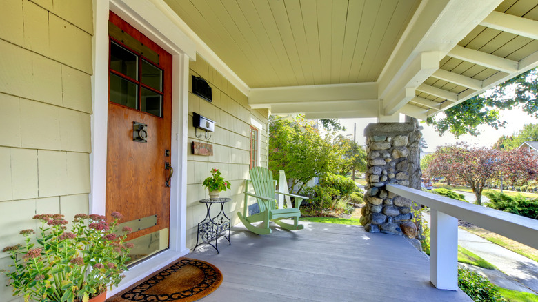 Craftsman porch and wide front door
