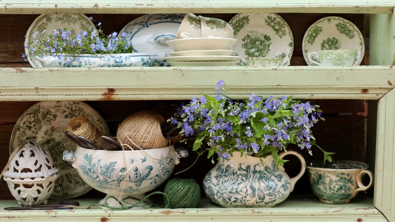 vintage ceramic dishes on shelf