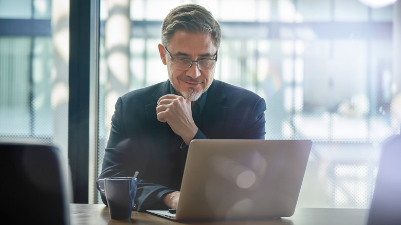 man with laptop