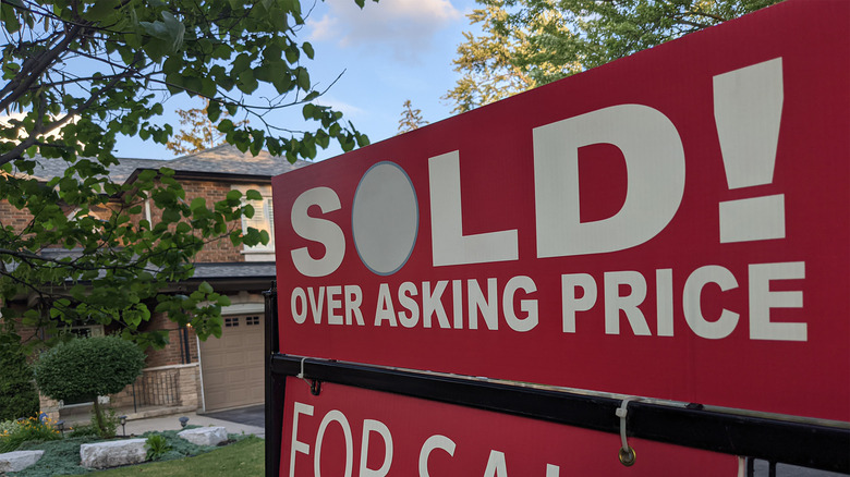 Close-up of for sale sign