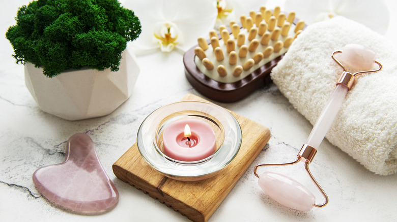 Several home spa gadgets sitting on a countertop