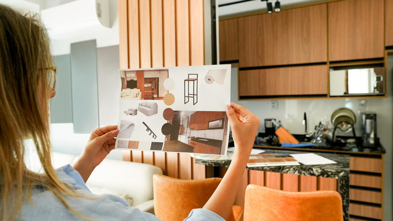 Woman designing kitchen
