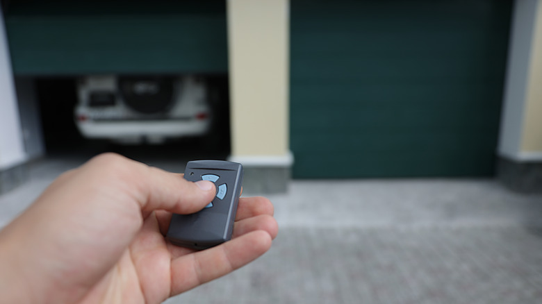 man opens garage door