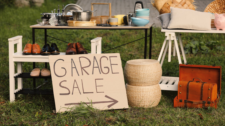 Items displayed neatly on tables at a garage sale