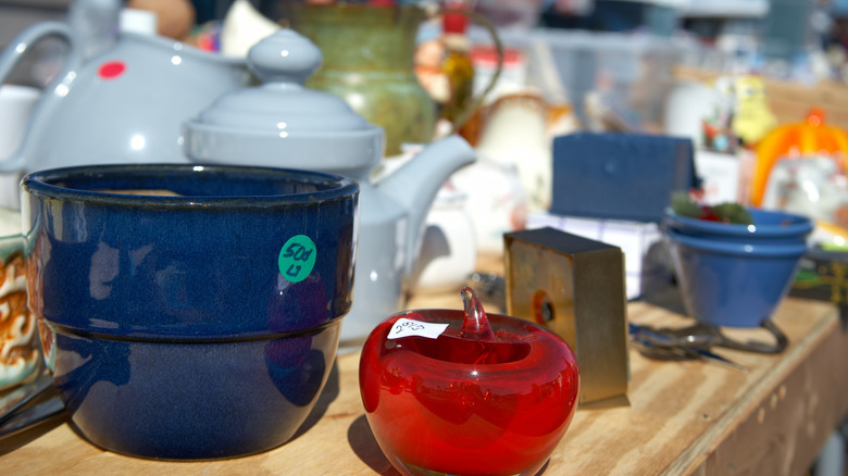 Different colored labels on items at a garage sale