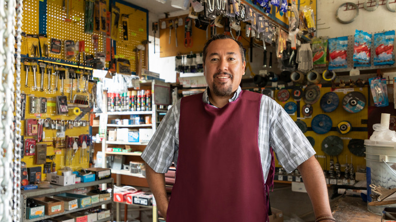 man smiling in hardware store