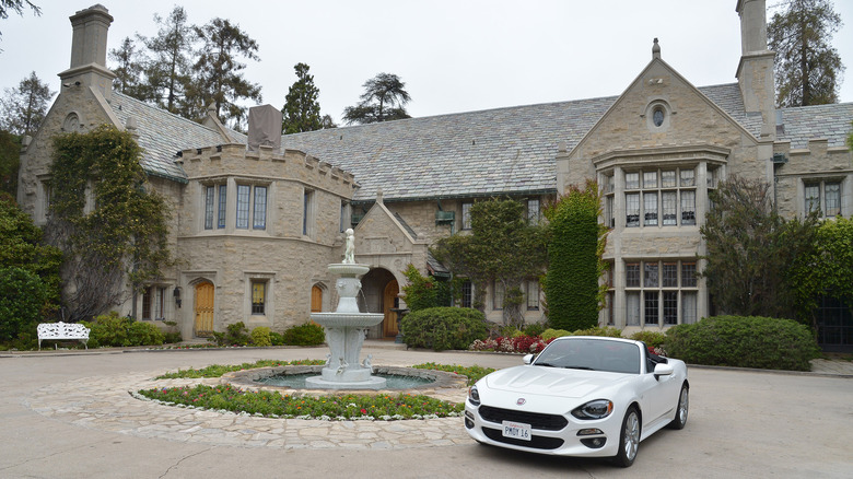 The Playboy mansion and car