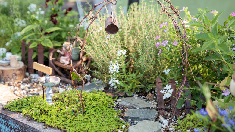 A fairy garden in someone's yard.