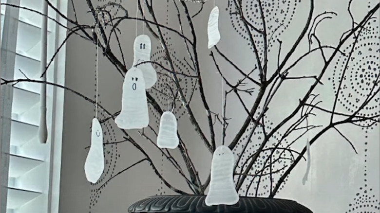 Glue ghosts with open mouths hanging off a tree
