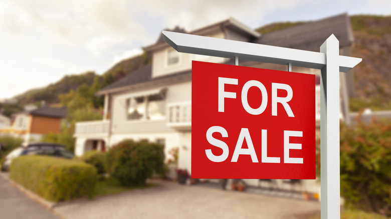 For sale sign on house