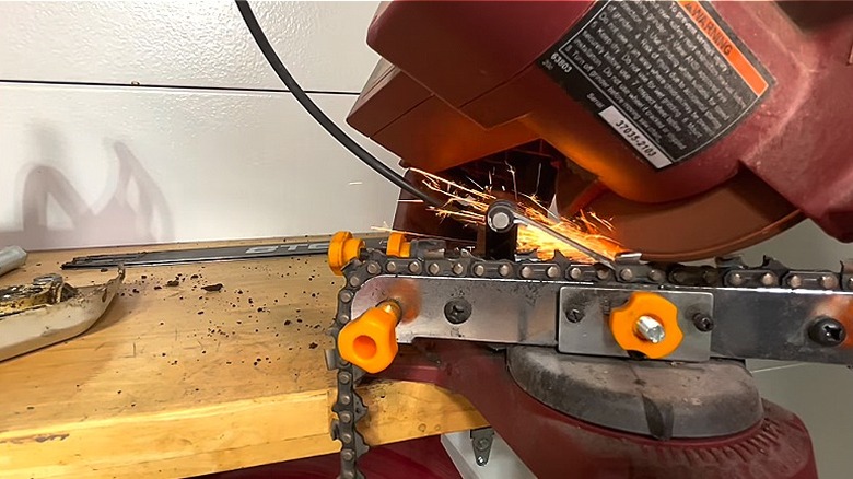 The Chicago Electric Power Tools Electric Chainsaw Sharpener sharpening a chainsaw blade