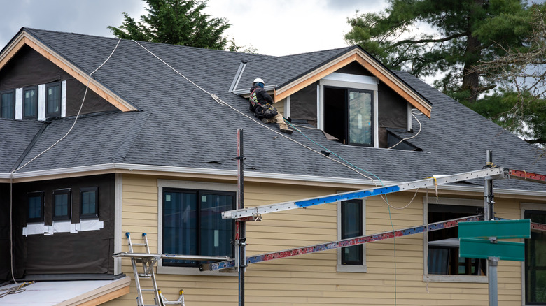 Fiber cement siding being used to mimic wood panels