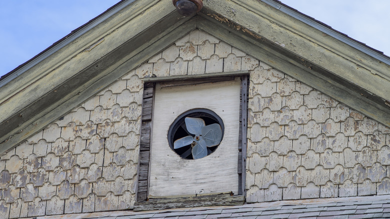 An attic fan in an old home