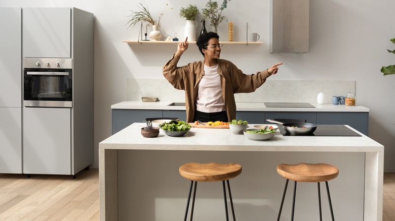 Person dancing in kitchen